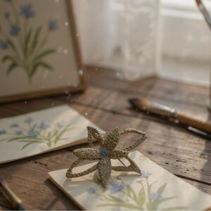 Swarovski Swan Logo Crystal Flower Brooch | Blue Accent Starburst Pin